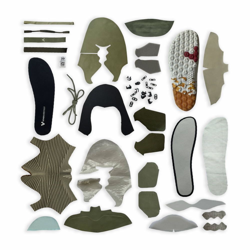 An exploded flatlay of different components of a Vivobarefoot shoe
