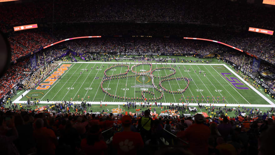 camera person run over ahead of college football national championship game yardbarker