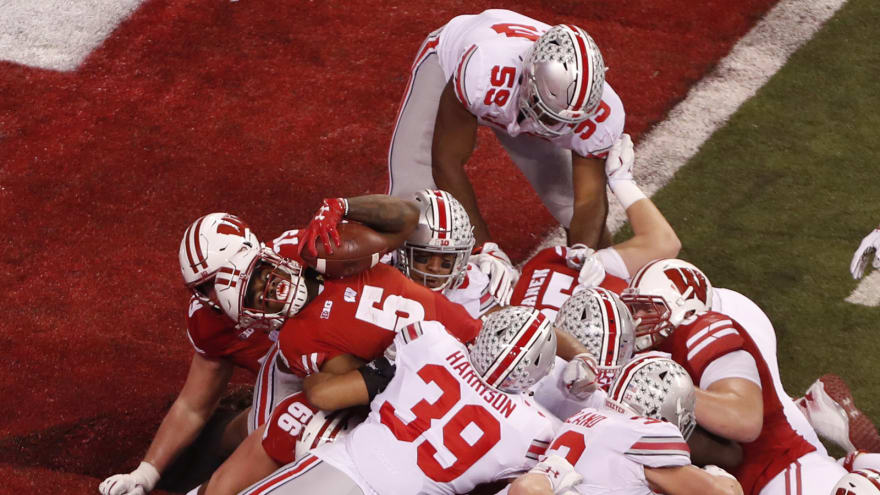 Twitter Reacts To Guy Fixing Turf At Big Ten Championship Game