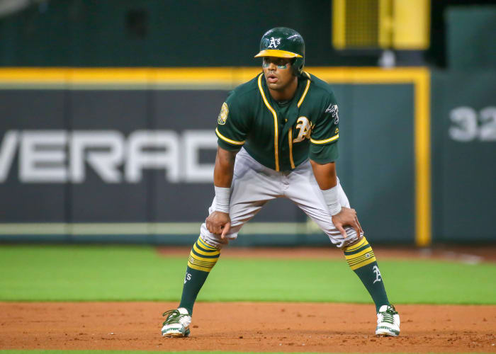 green and gold baseball jerseys