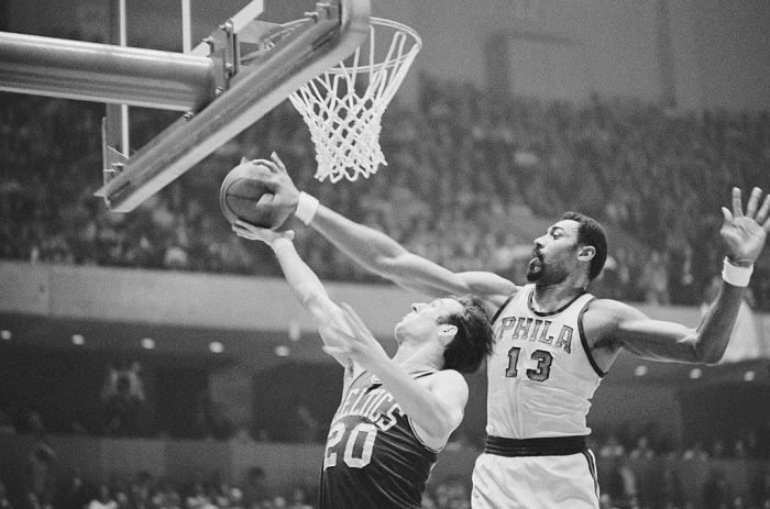 Wilt Chamberlain scores 100 points