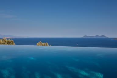 Infinity created from the pool and the beautiful sea view.