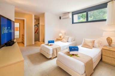 Bedroom 3, at garden floor with toilet and private bathroom