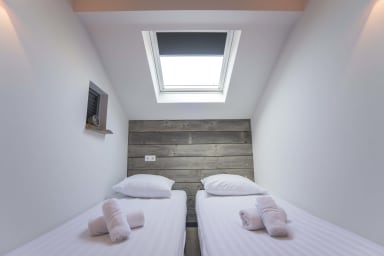 Our bedroom. Some call it small, we call it cozy :)