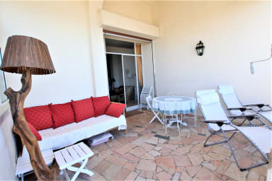 terrace equipped, lougne area, dining table, deck chair with view on the sea