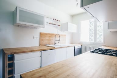 Fully-equipped kitchen with a gas stove 