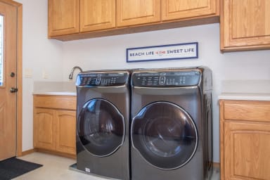 Laundry Room with Sink, Washer and Dryer