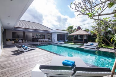 View from one of the many sunbeds next to the pool.