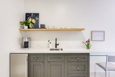 Kitchenette with Nespresso coffee machine, microwave & mini fridge