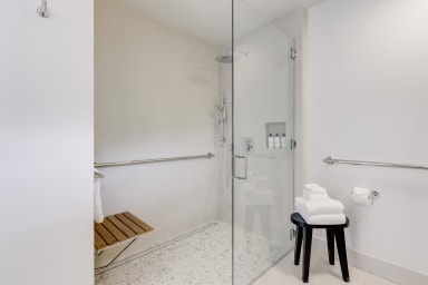 A private bath with a rain shower