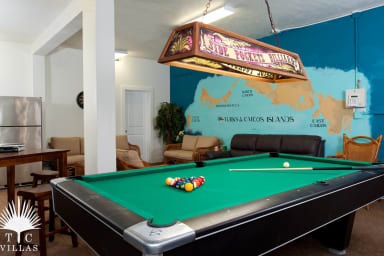 Reef Pearl's lower level game room with pool table.