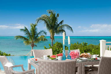 Outdoor dining table at Turtle Beach Villa.