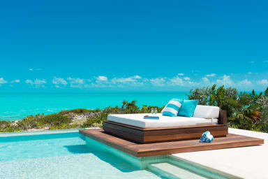 Aguaribay's private pool offers a sunbed overlooking Long Bay Beach. 