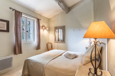 Heated pool and exceptional view for this house to rent in Ménerbes