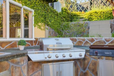 Outside built in kitchen with BBQ!