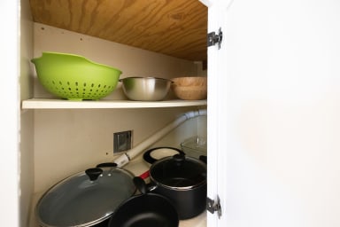 Practical kitchen with all essential cooking tools and utensils