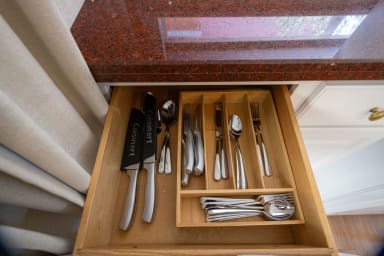 Practical kitchen with all essential cooking tools and utensils