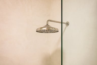 En-suite bathroom with rain shower and high-end toiletries