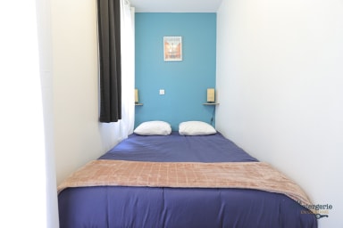 Coin nuit attenant à l'espace de séjour