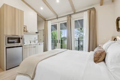 Queen-size bed, sleeps 2 and Kitchenette with Nespresso and Mini Fridge