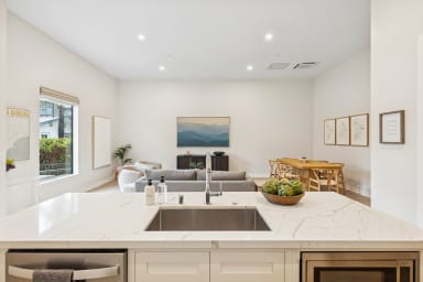 Kitchen island with open living and dining view.