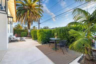 A cozy communal corner, lit for conversation and relaxation.
