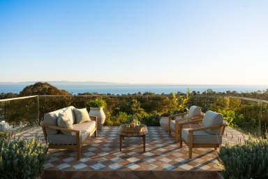 Inviting outdoor seating area perfect for gatherings, sunsets, and lounging