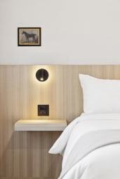 King-size bed, sleeps 2, seating area, and 65