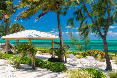 Reef Pearl offers a private beachfront deck facing Grace Bay.