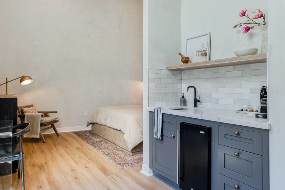 Kitchenette with mini-fridge, sink, and a Keurig (no stove)