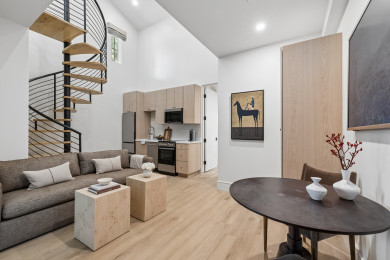 Cozy living area with sofa and TV