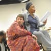 Matthew Ashforde as Scrooge and Angela Wynter as the Ghost of Christmas Present in rehearsals for A Christmas Carol