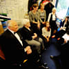 Volunteers meet with Front of House Manager Kevin Jones before a performance