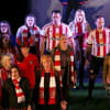 In the full strip: (L) Miles Horner with Fiona Tobin in front of him) and (R) Jonathan Cooke with Caroline Kennedy in front of him