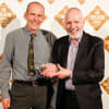 The Dukes Artistic Director, Joe Sumsion and Executive Director, Ivan Wadeson with The UK Theatre Award