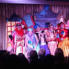 Simon Gross as Lady Abanazar, Ema Unguru as Slave of the Ring, Eren Arken as Aladdin, Ellie Makewell as Princess Jasmine, Campbell Glazier as Widow Twankey and Angus Dustagheer as Wishee Washee