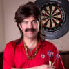 Jody Kamali as hapless darts champion Mike Daly