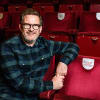 Sir Matthew Bourne with the seat plaque