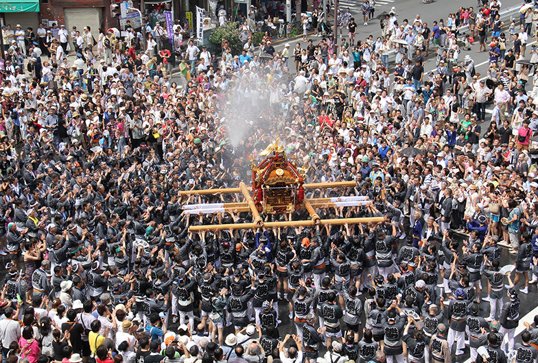 Experience the Mikoshi Parading Through the Streets and the Intense Heat of the Bearers That Makes the Ground Rumble