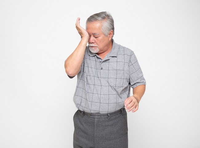 Asian,Senior,Man,With,Eye,Pain,Isolated,On,White,Background,