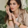 Golden Grass Mandala Earrings Studded with Black zirconias