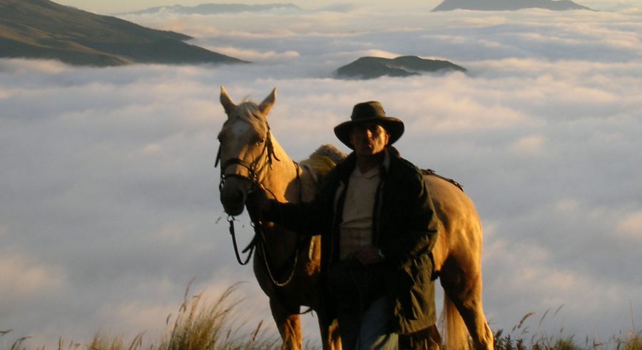 Walking with a horse in Cotopaxi, Ecuador/Galapagos