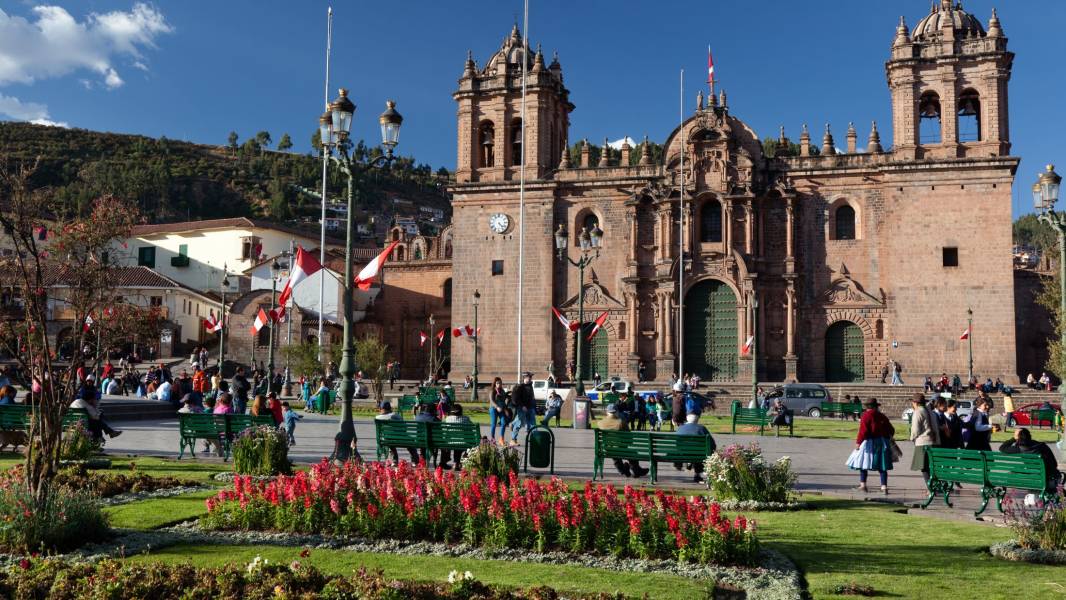 a group of people standing in front of a church