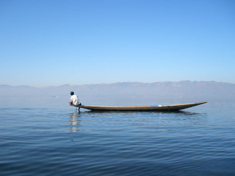 a small boat in a body of water