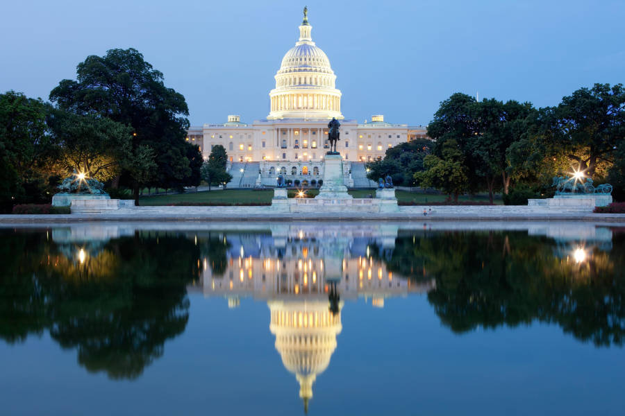 United States Capitol next to a body of water
