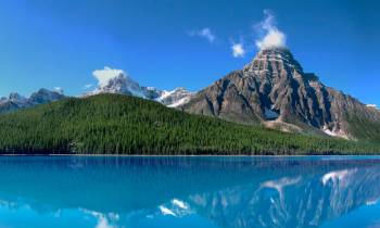 a lake with a mountain in the background