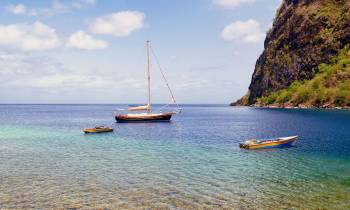 a small boat in a body of water