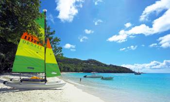 a boat sitting on top of a beach