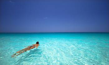 a man in a pool of water