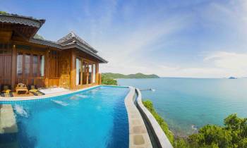 a pool next to a body of water